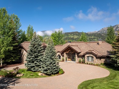 Nestled amid tranquil water features with sweeping views of the - photo 2