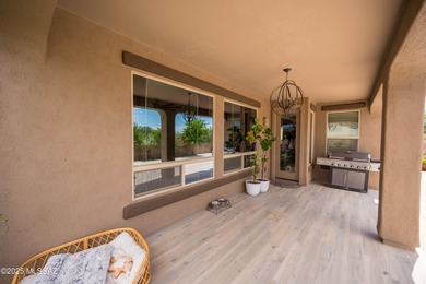 This gorgeous home is located the beautiful community of Saguaro