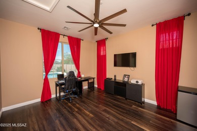 This gorgeous home is located the beautiful community of Saguaro
