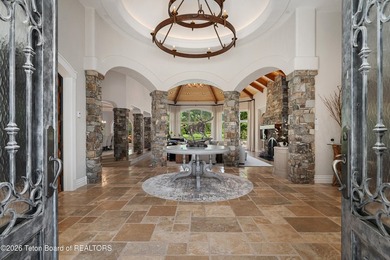 Nestled amid tranquil water features with sweeping views of the - photo 7