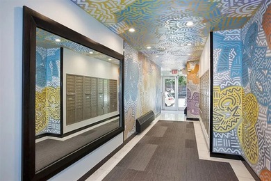 Welcome to Residence B2B, a three-bedroom, one-bath condominium - photo 20