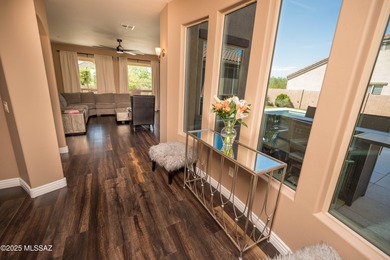 This gorgeous home is located the beautiful community of Saguaro