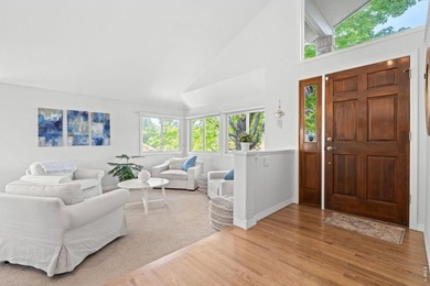 Backing to Lake Valley Golf Club, this beautifully updated - photo 3