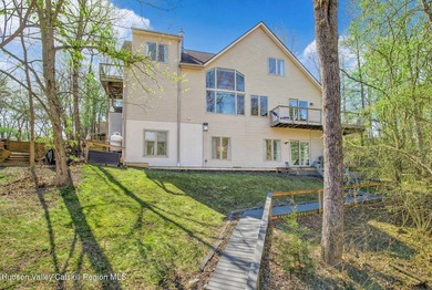 Commanding attention from the moment you enter, this waterfront - photo 3