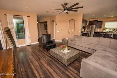 This gorgeous home is located the beautiful community of Saguaro