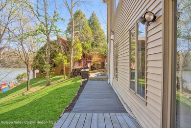 Commanding attention from the moment you enter, this waterfront - photo 6
