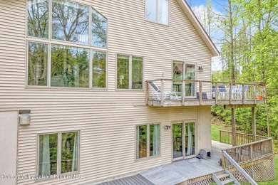 Commanding attention from the moment you enter, this waterfront - photo 7