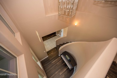 This gorgeous home is located the beautiful community of Saguaro