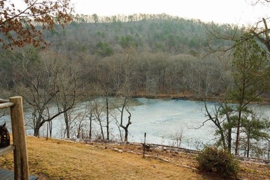 A 280-foot canyon drop from mountain ridge to river, anchored by - photo 34