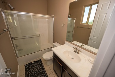 This gorgeous home is located the beautiful community of Saguaro