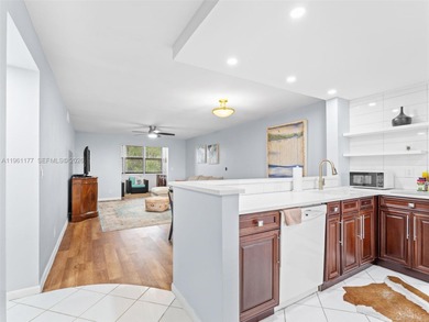 Turnkey, furnished, and top-floor living in a well-maintained