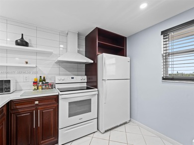 Turnkey, furnished, and top-floor living in a well-maintained