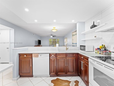 Turnkey, furnished, and top-floor living in a well-maintained