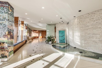 Enjoy lakefront living in this spacious 1BR/1BA condo at