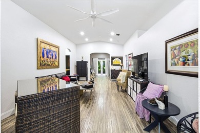 Wel maintained 3BR/2BA home with a 2 car garage in the gated - photo 4