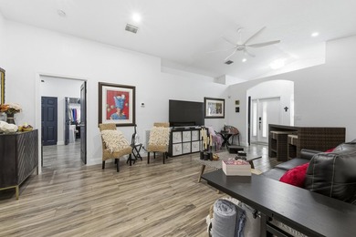 Wel maintained 3BR/2BA home with a 2 car garage in the gated - photo 6