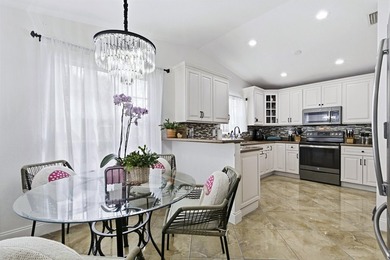 Wel maintained 3BR/2BA home with a 2 car garage in the gated - photo 9