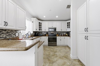 Wel maintained 3BR/2BA home with a 2 car garage in the gated - photo 10