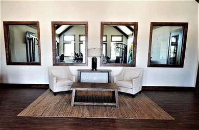 What a great view! This fully wooded lot in Pronghorn looks out