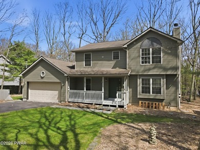 This beautifully maintained home sits on a 1-acre wooded - photo 3