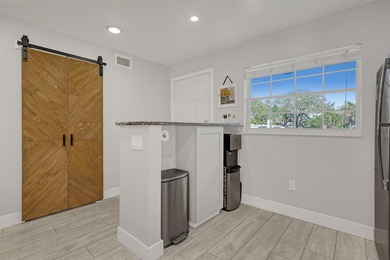 Welcome to this beautifully updated, light-filled corner unit - photo 5