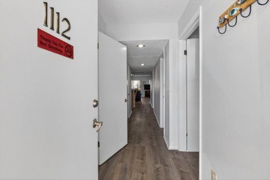 Experience coastal living at its finest in this ground-floor - photo 3