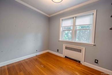 Picture-perfect 3-bedroom, 1.5-bath Tudor set on a tree-lined - photo 12
