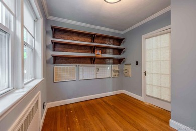 Picture-perfect 3-bedroom, 1.5-bath Tudor set on a tree-lined - photo 13