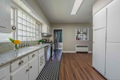 Picture-perfect 3-bedroom, 1.5-bath Tudor set on a tree-lined - photo 14