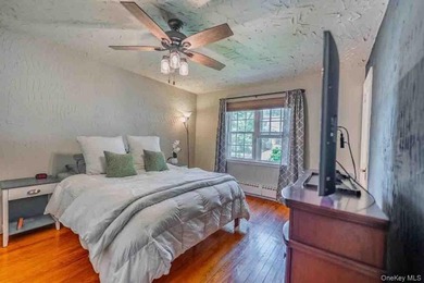 Picture-perfect 3-bedroom, 1.5-bath Tudor set on a tree-lined - photo 21