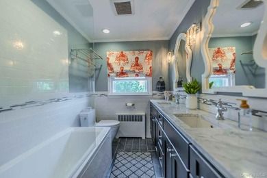 Picture-perfect 3-bedroom, 1.5-bath Tudor set on a tree-lined - photo 25