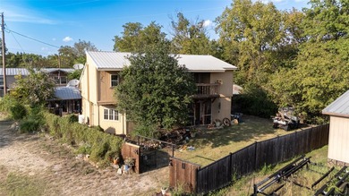 Affordable Waterfront Opportunity at Moss Lake. Discover the - photo 2