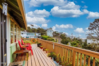Mid-town beauty with large decks and ocean and surf views from - photo 2