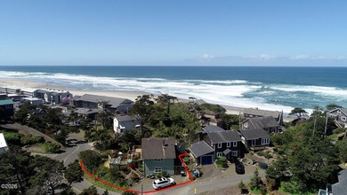 Mid-town beauty with large decks and ocean and surf views from - photo 3