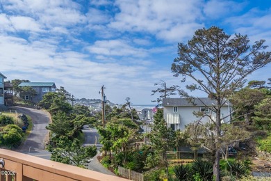 Mid-town beauty with large decks and ocean and surf views from - photo 5