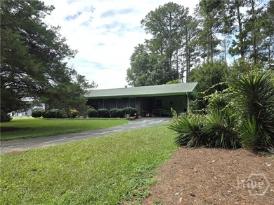 Opportunity awaits with this solid 1978 four-sided brick ranch - photo 2