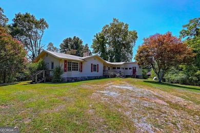This exceptional 10.74-acre property in Lakemont, GA, presents a - photo 2