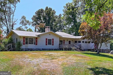 This exceptional 10.74-acre property in Lakemont, GA, presents a - photo 9
