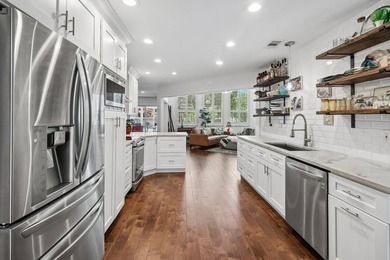 This lakefront home is a unicorn! Located within the gated - photo 11