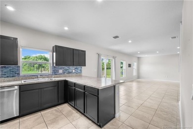 Move-in ready and beautifully maintained, this spacious - photo 11