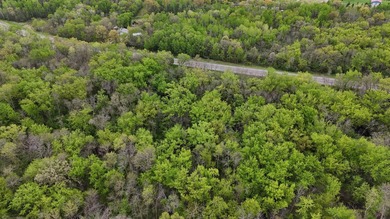 Beautiful 15-acre wooded property along the Rum River featuring - photo 23