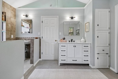 This lakefront home is a unicorn! Located within the gated - photo 24