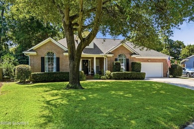 Located on the south end of St. Simons Island, this all-brick - photo 3