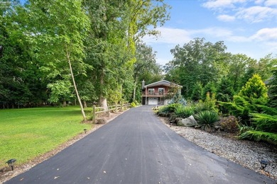 Discover the rare opportunity to own a modern retreat on coveted - photo 3
