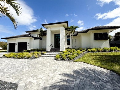 Welcome to 1702 Ludlow Road, a custom home situated on an - photo 1