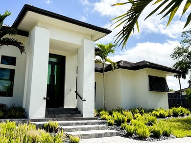 Welcome to 1702 Ludlow Road, a custom home situated on an - photo 3