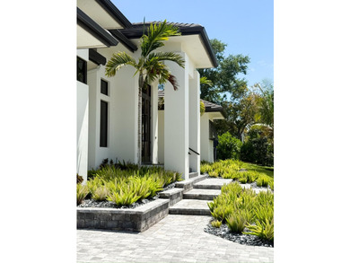 Welcome to 1702 Ludlow Road, a custom home situated on an - photo 5