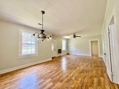 Charming and affordable 3-bedroom, 1-bath brick home! Features - photo 4