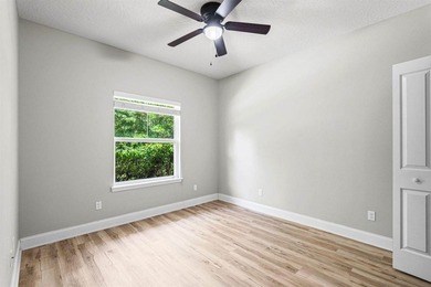 This home has a 3% assumable VA mortgage but that's not even the - photo 34