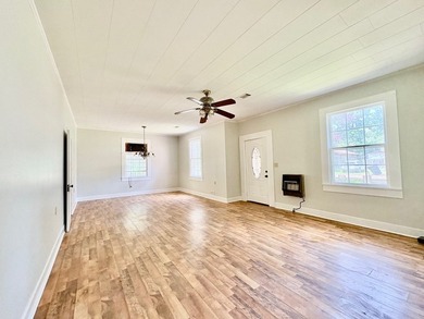 Charming and affordable 3-bedroom, 1-bath brick home! Features - photo 5